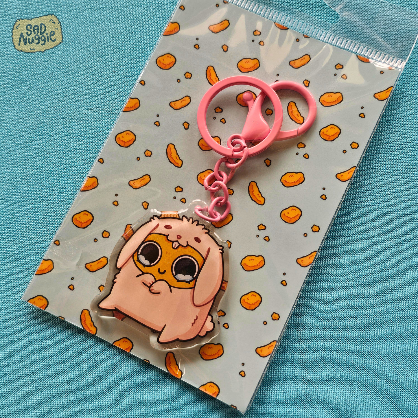 Sad Nuggie Bunny Epoxy Keychain