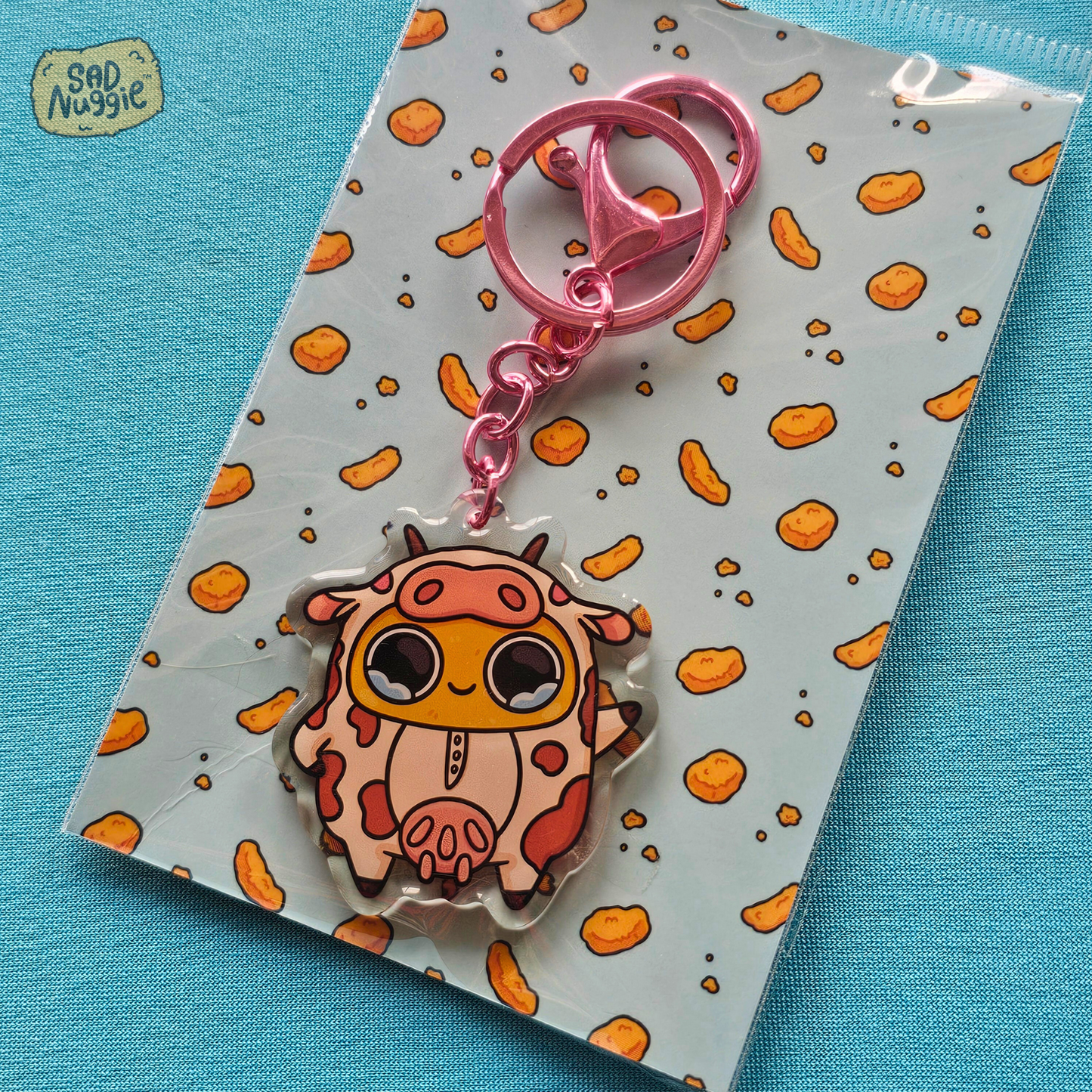 Sad Nuggie Cow Epoxy Keychain