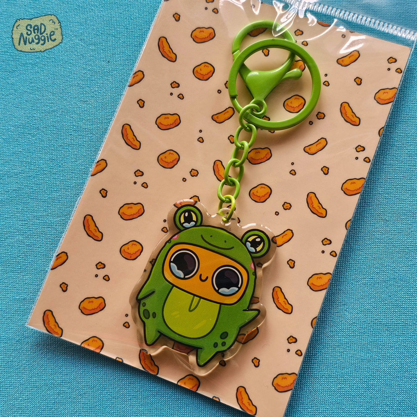 Sad Nuggie Frog Epoxy Keychain