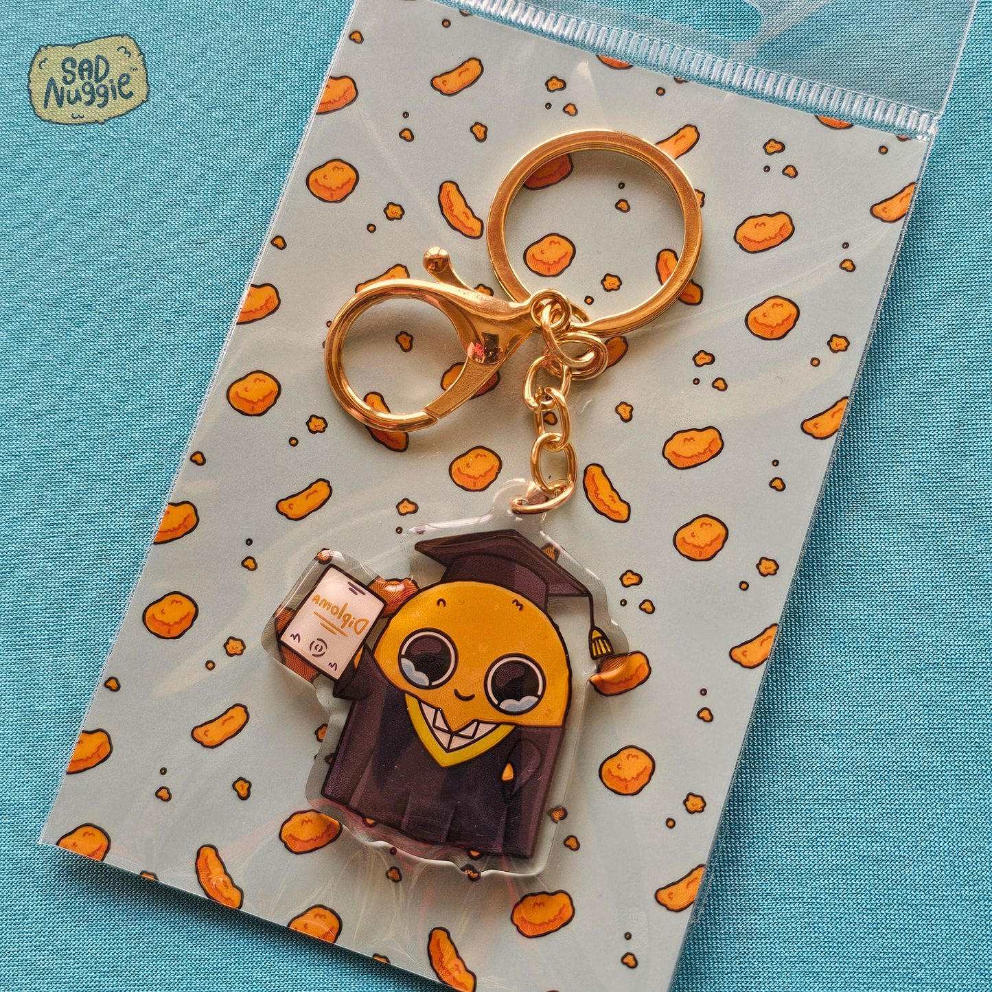 Sad Nuggie Graduation Epoxy Keychain