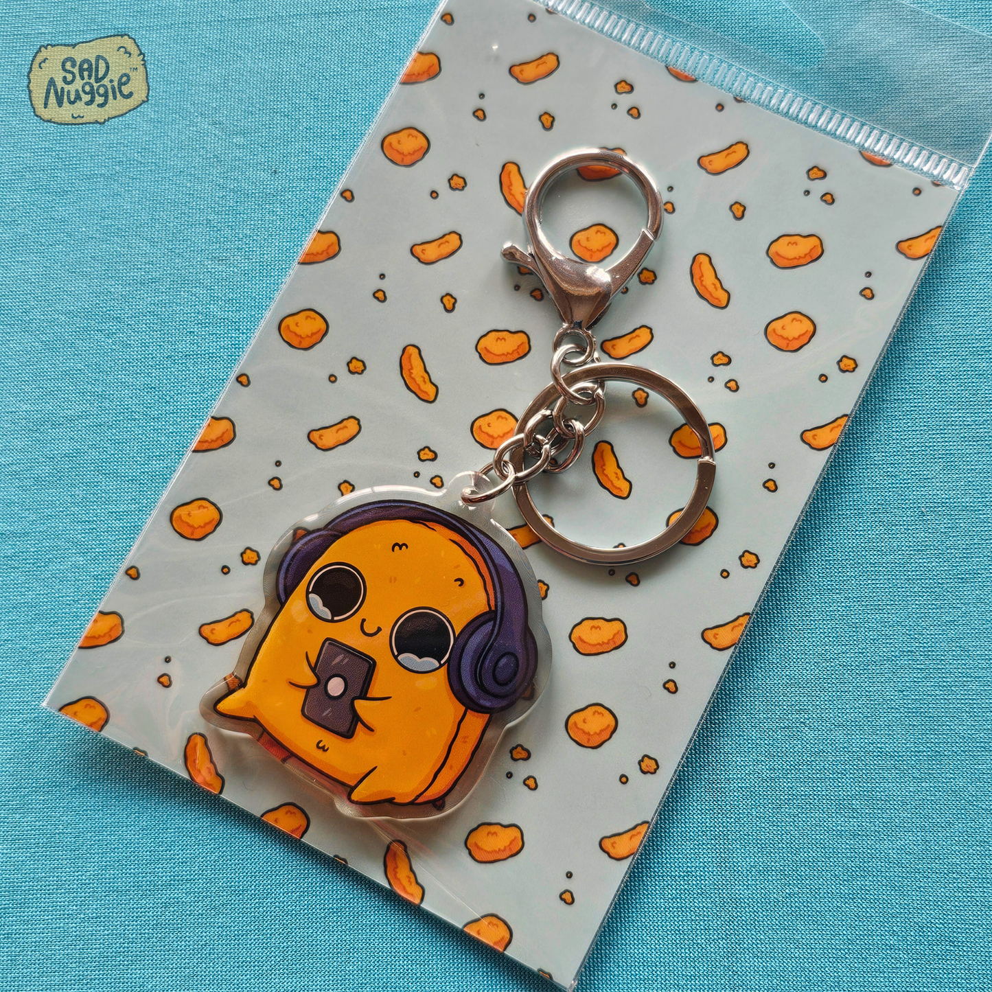 Sad Nuggie Headphones Epoxy Keychain