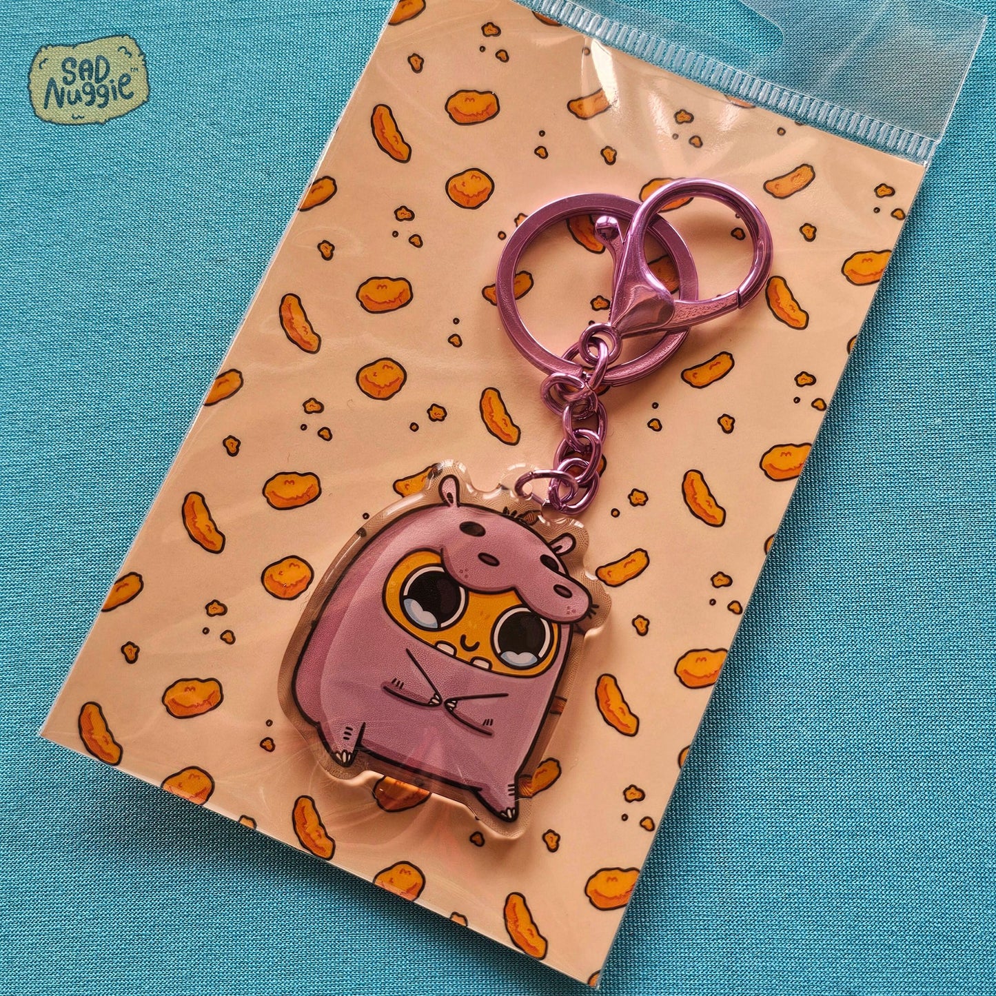 Sad Nuggie Hippo Epoxy Keychain