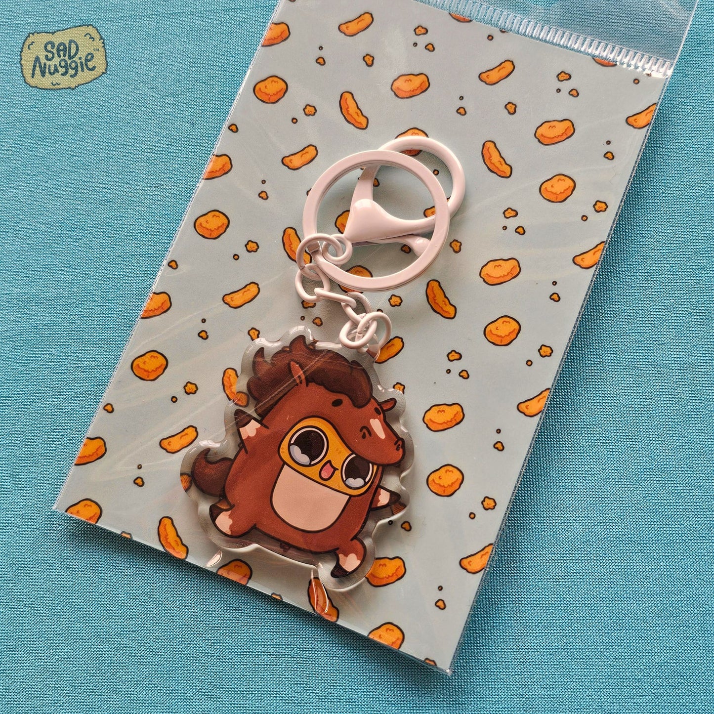 Sad Nuggie Horse Epoxy Keychain