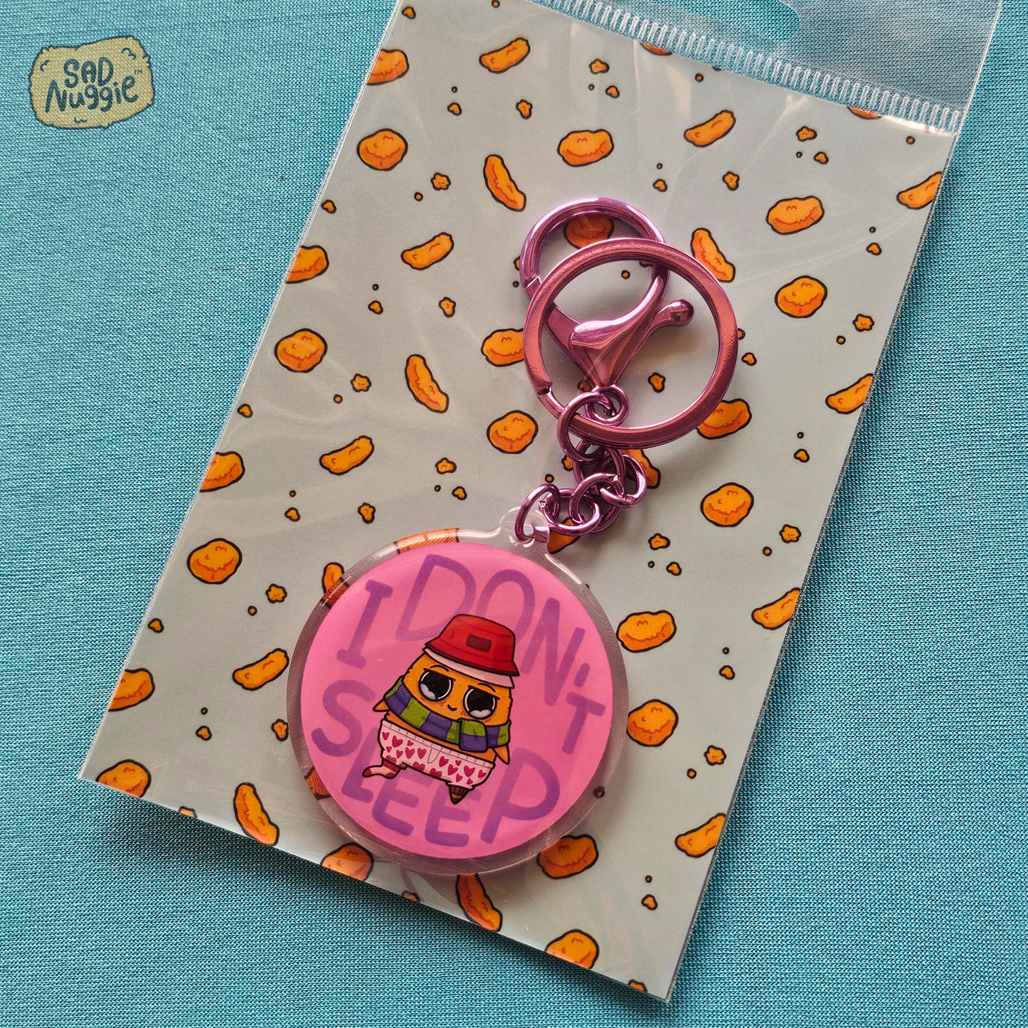 Sad Nuggie I Don't Sleep Epoxy Keychain