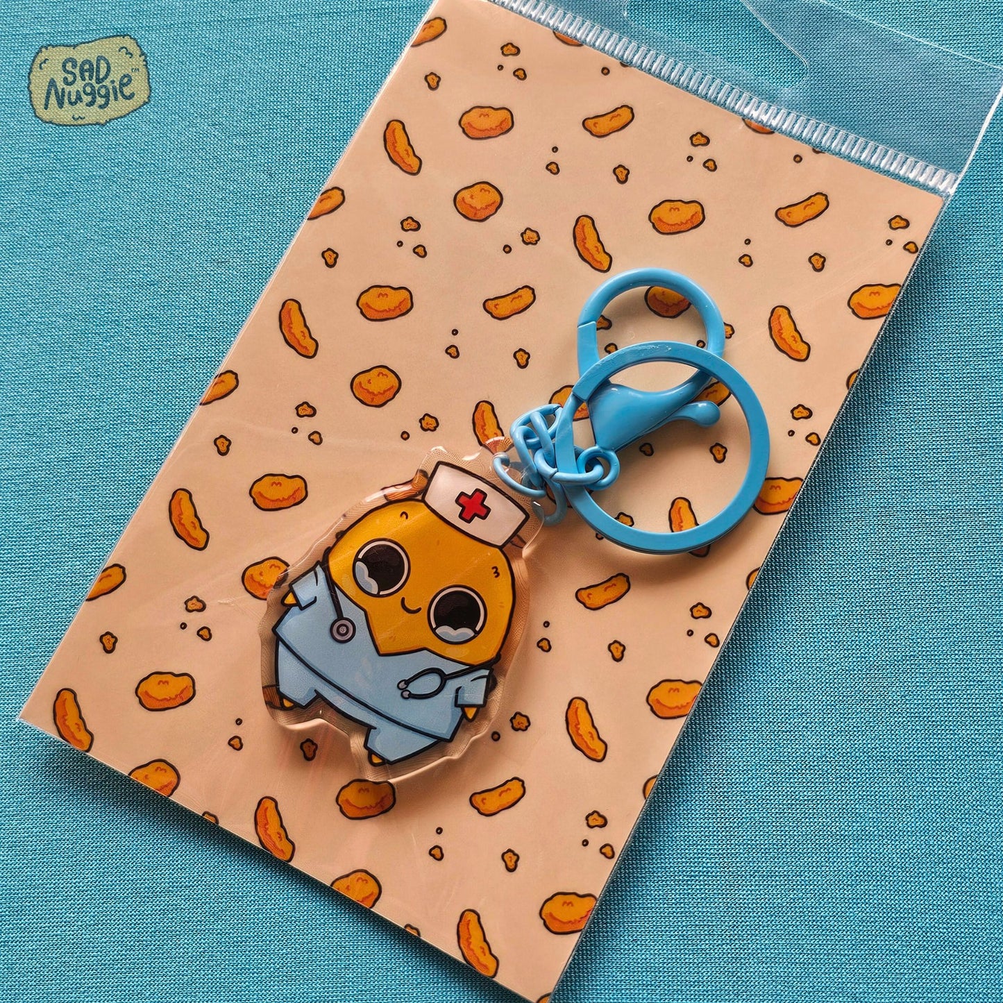 Sad Nuggie Nurse Epoxy Keychain