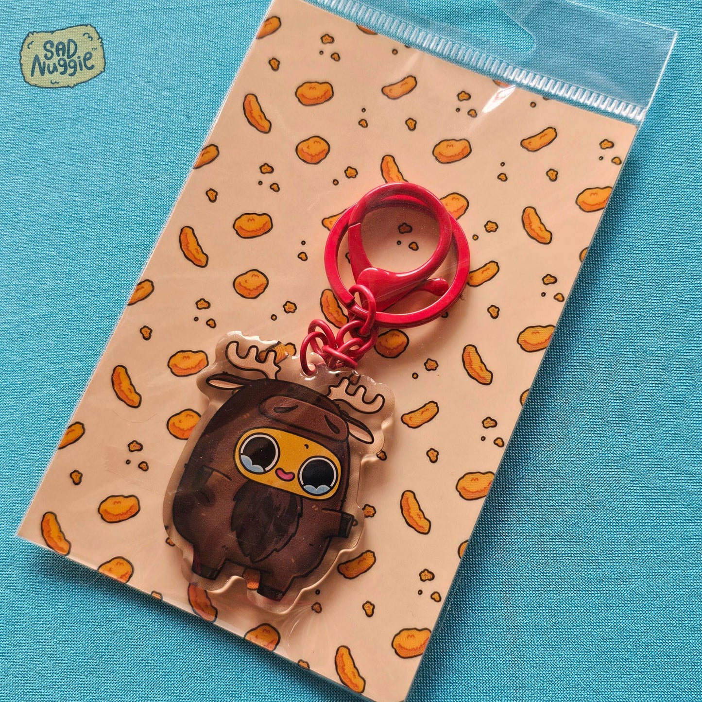 Sad Nuggie Moose Epoxy Keychain